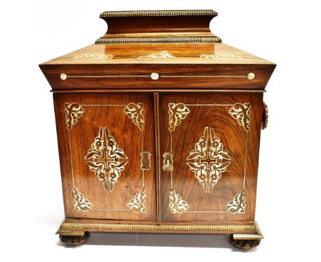 A VICTORIAN ROSEWOOD MOTHER-OF-PEARL INLAID SEWING BOX  the caddy top opening to red silk lined interior and mirror with stat