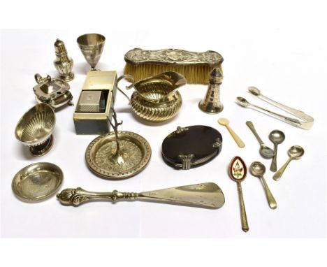 AN ASSORTED LOT OF SMALL SILVER ITEMS to include a silver condiment, egg cup, ring tree, salt, cream jug, sugar tongs, napkin