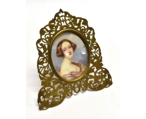 19TH CENTURY SCHOOL Miniature portrait of a young lady, oil probably on ivory, unsigned, 8.5cm x 6.5cm (oval), in an ornate g