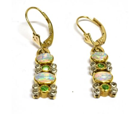 A PAIR OF OPAL, DEMANTOID GARNET AND DIAMOND SET DROP EARRINGS  two oval cabochon cut opals to each earring, 6mm and 5mm wide