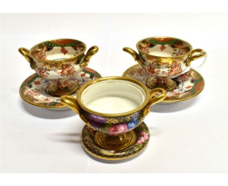 A PAIR OF SPODE TWIN HANDLED CABINET CUPS AND SAUCERS pattern 967, and another similar