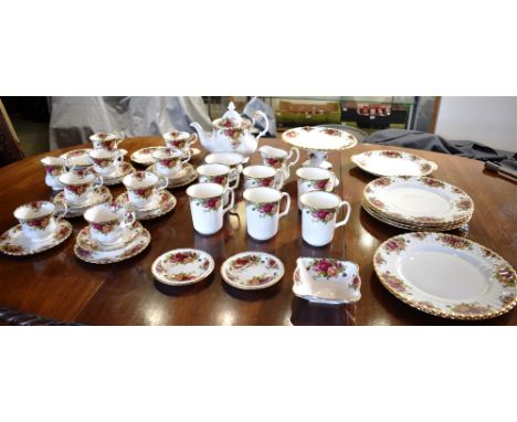 AN EXTENSIVE COLLECTION OF ROYAL ALBERT 'OLD COUNTRY ROSES' DINNERWARE comprising six dinner plates, teapot, set of six mugs,
