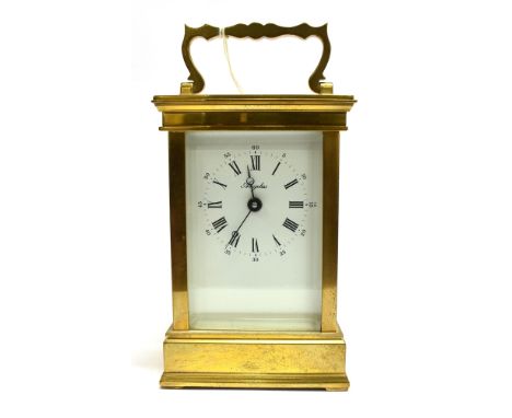 A FRENCH LACQUERED BRASS 8-DAY CARRIAGE CLOCK  the enamel dial with Roman and Arabic numerals, signed 'Angelus', 13cm high ov