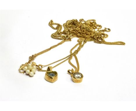 FOUR 9 CARAT GOLD PENDANTS AND CHAINS comprising topaz set, cubic zirconia set and a seed pearl set, together with a 9 carat 