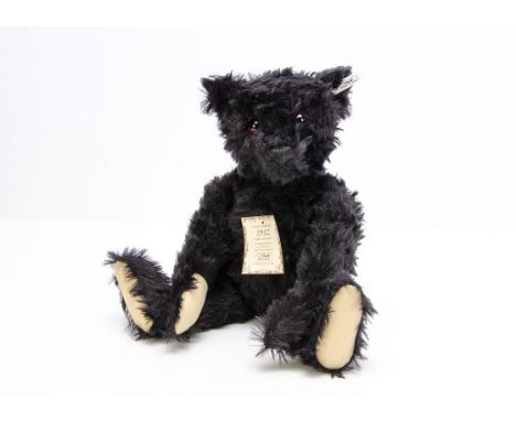 A Steiff limited edition British Collector's 1912 black Replica Teddy Bear,  2275 of 3000, in original box with plastic lid a