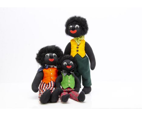 Three Robin Rive Gollies, in felt waistcoats with seam labels --17½in. (44.5cm.)high.These items are listed on the basis they