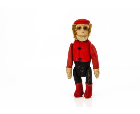 A rare Schuco bellhop monkey flask late 1920s,  with flocked tinplate face, brown mohair head, white mohair chin, jointed met