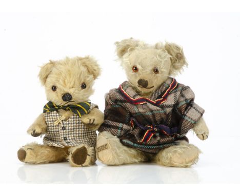 Two post-war British teddy bears,  a Merrythought with blonde mohair, orange and black glass eyes, jointed, printed cloth lab