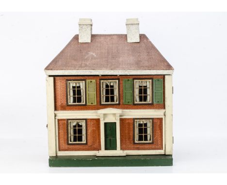 A G &amp; J Lines Brothers dolls' house circa 1919, with brick paper façade, central green painted front door, five tinplate 