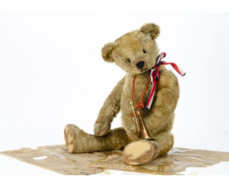 ‘Soldier Boy’ an early German teddy bear circa 1910,  with blonde mohair, black boot button eyes, pronounced clipped muzzle, 