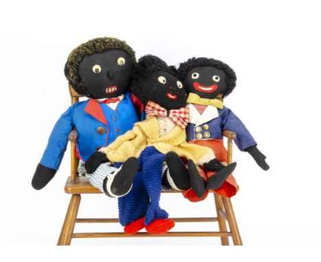 Three old Gollies, a Golly with nose, probably 1910 with tight wool hair, stitched mouth with bar teeth, unjointed, probably 