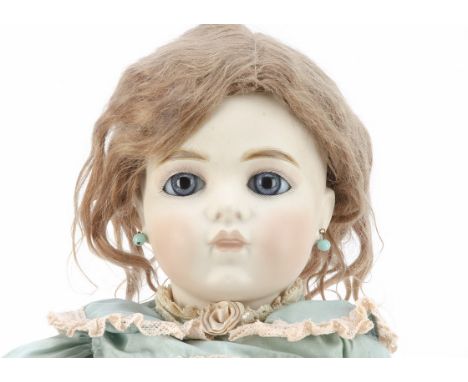 A fine quality reproduction Bru Jne 13 bebe by Mary Benner,   with blue eyes, light brown mohair wig, jointed composition bod