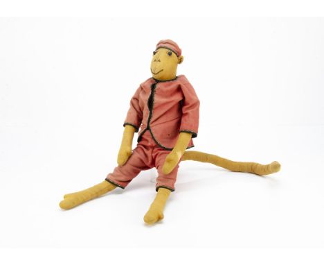 An unusual early dressed cloth monkey circa 1905,  of brown brushed cotton, black boot button eyes with white linen discs beh