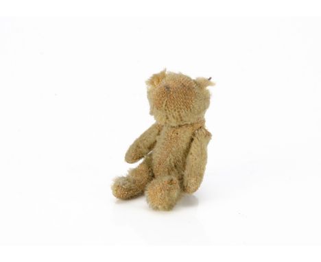 A Farnell World War One 'soldier' teddy bear,  with blonde mohair, pipe-cleaner ears, swivel head and pin-jointed limbs --3½i