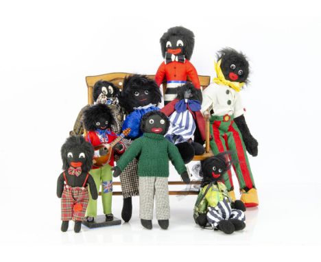 Eight artist Gollies, a Sue Coupe musician Golly playing mandolin --13in. (33cm.) high; a Evelyn May; a Gingerbread Bears Gol