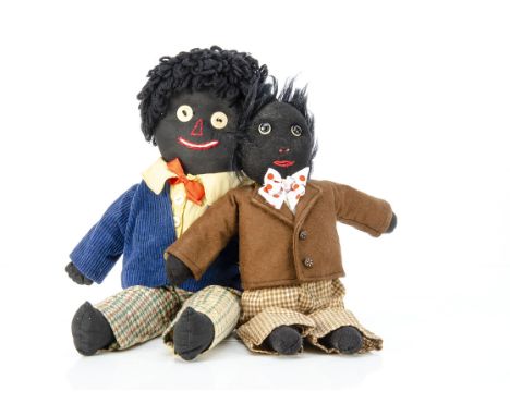 Two 1930s home-made Gollies,  one of black cloth with linen button eyes, stitched features and wool hair --16½in. (42cm.) hig