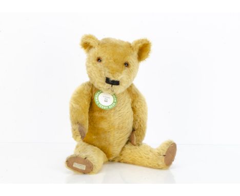 Maggie a Chad Valley Magna teddy bear 1930s,  with golden mohair, orange and black glass eyes, pronounced muzzle, black stitc