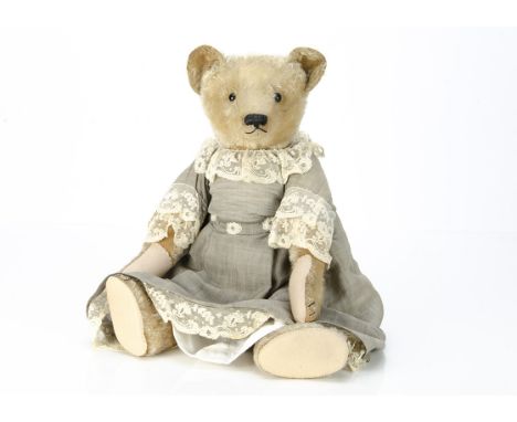 Valentina the childhood teddy bear of Doris Willis circa 1910,  an early Strunz teddy bear with blonde mohair, black boot but