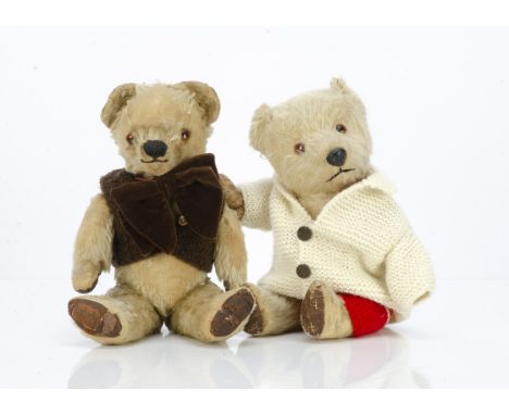 Two post-war British teddy bears,  a Chad Valley with blonde mohair, orange and black  glass eyes, black stitched nose and mo