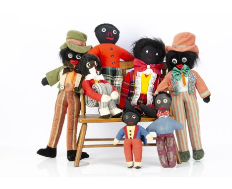 Seven various post-war Gollies, two similar 1970s craft-made Gollies in top hats --18in. (46cm.) high; three others home-made