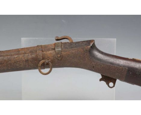 A 19th century Middle Eastern matchlock long rifle with sighted shaped barrel, barrel length 120.5cm, and steel furniture, th