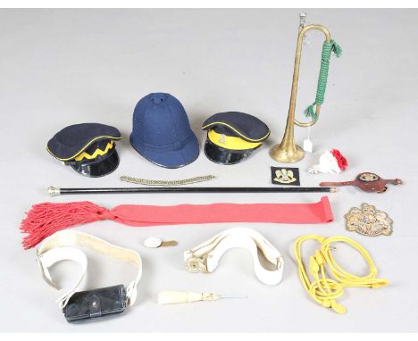 A collection of military and other items, including a bugle by John Grey &amp; Sons, London, a post-1952 embroidered cloth ba