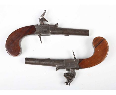 A pair of early 19th century flintlock pistols by Wheeler, London, with round turn-off barrels, barrel length 5.7cm, roulette