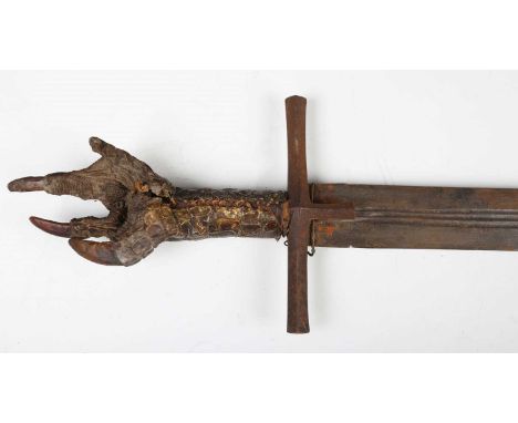 An unusual 19th century Sudanese Mahdist kaskara sword with double-edged fullered blade, blade length 93cm, and T-shaped squa