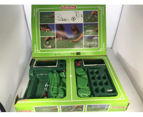 Job lot of Subbuteo and extras. Original game, set of fan stands, World Cup goals extra, corner kickers extra, extra players,