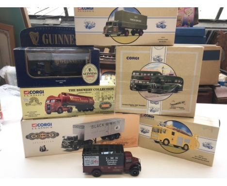 A collection of Corgi Classics including, a Fire Engine and busses.