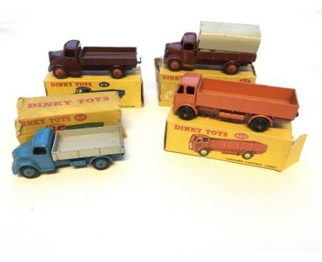 A Dinky Forward Control lorry #420, a Rear Tipping wagon #414, a Austin wagon #412 and a Austin Covered wagon #413 all boxed.