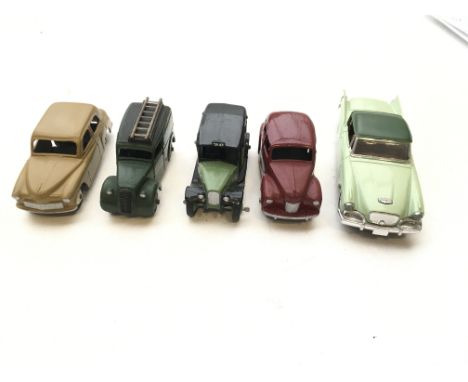 A Dinky Toys Hillman Minx #154 a Telephone service van #261,a vintage taxi,a Austin Devon and a Solido Studebaker 1957 Silver