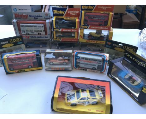 A collection of Dinky and Corgi boxed cars.