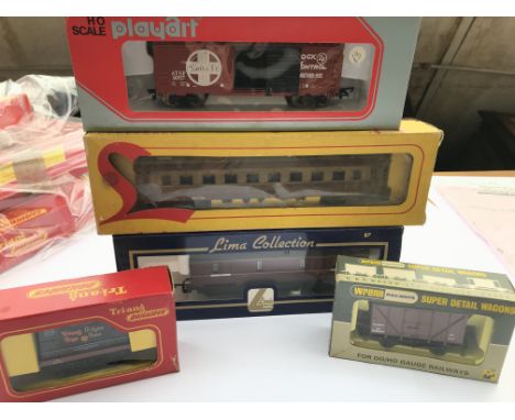 A collection of railway carriages including coaches etc, a Solido double decker bus and others.