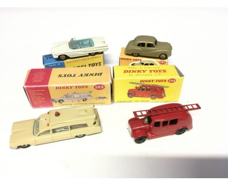 A Dinky Austin Somerset Saloon #161, a Superior Criterion Ambulance #263, a Streamlined Fire Engine #250 and a corgi Ford Thu