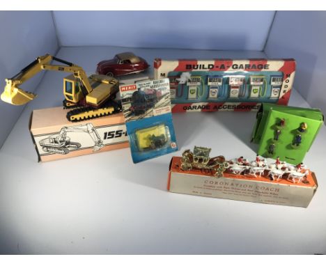 A minimarque 43 Austin A90 Atlantic, an NZG model hydraulic excavator #204, an A. Barrett &amp; Sons Coronation Coach, a "Bui