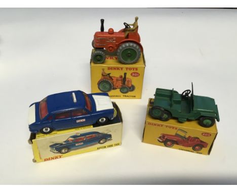 A Dinky Austin 1800 taxi #282, a universal Jeep #405 and a Field-Marshall tractor #301. All boxed.