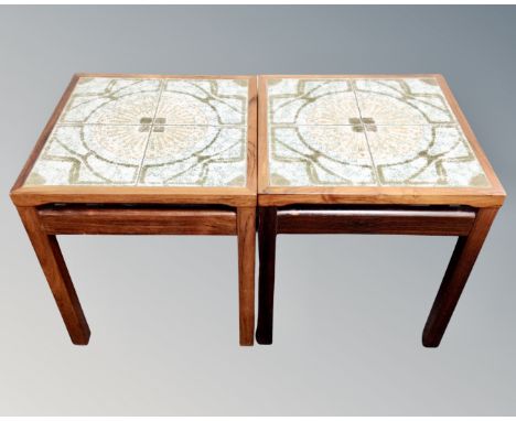 A pair of Scandinavian rosewood tile topped lamp tables 