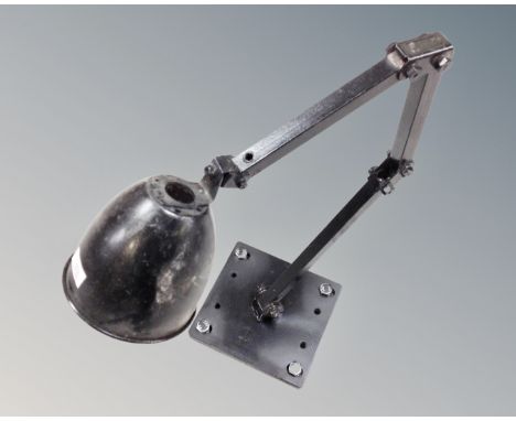 A mid 20th century industrial angle poise lamp 