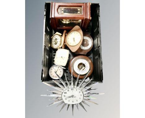 A crate of mantel and desk clocks, Acctim sunburst wall clock, barometer etc 