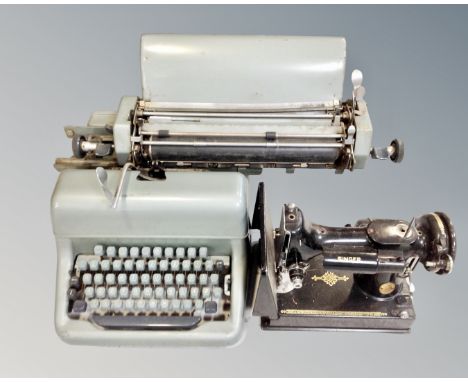 A vintage Singer electric sewing machine (no lead), together with typewriter