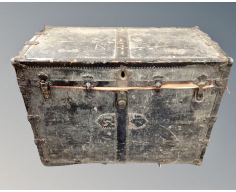 An antique metal bound shipping trunk 