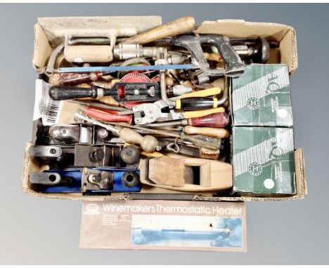 A box of woodworking tools, planes, drills, brace, hand saw, door furniture etc 