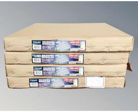 Four Deluce lighting recessed LED modular panels, boxed.