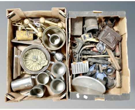Two boxes of antique and later metal wares, fire dogs, tankards, vintage lamps, copper pan lid, fire tongs etc 