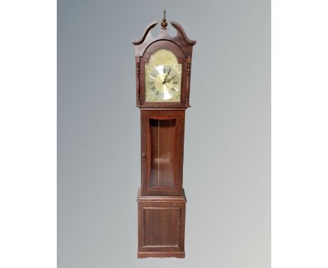 A Tempus Fugit longcase clock.