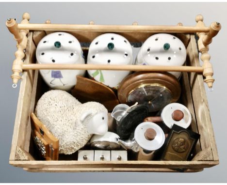A vintage pine crate containing kitchen wall racks, storage jars, mid century tea ware, barometer etc 