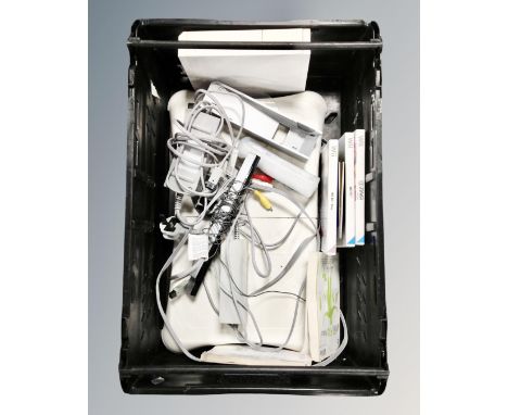 A crate of Nintendo Wii console, leads and games, Wii Fit board 