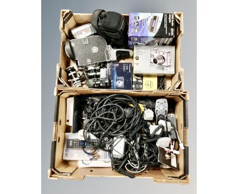 Two boxes of digital cameras, vintage cine camera, leads, remotes etc 