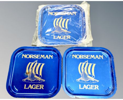Twelve vintage Norseman lager pub tin trays 